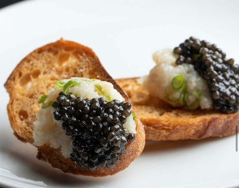 Premium Kaluga Amur Caviar in a clear glass jar