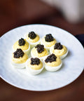 Jar of premium Royal Ossetra Sturgeon Caviar with rich texture