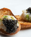 Premium Kaluga Amur Caviar in a clear glass jar